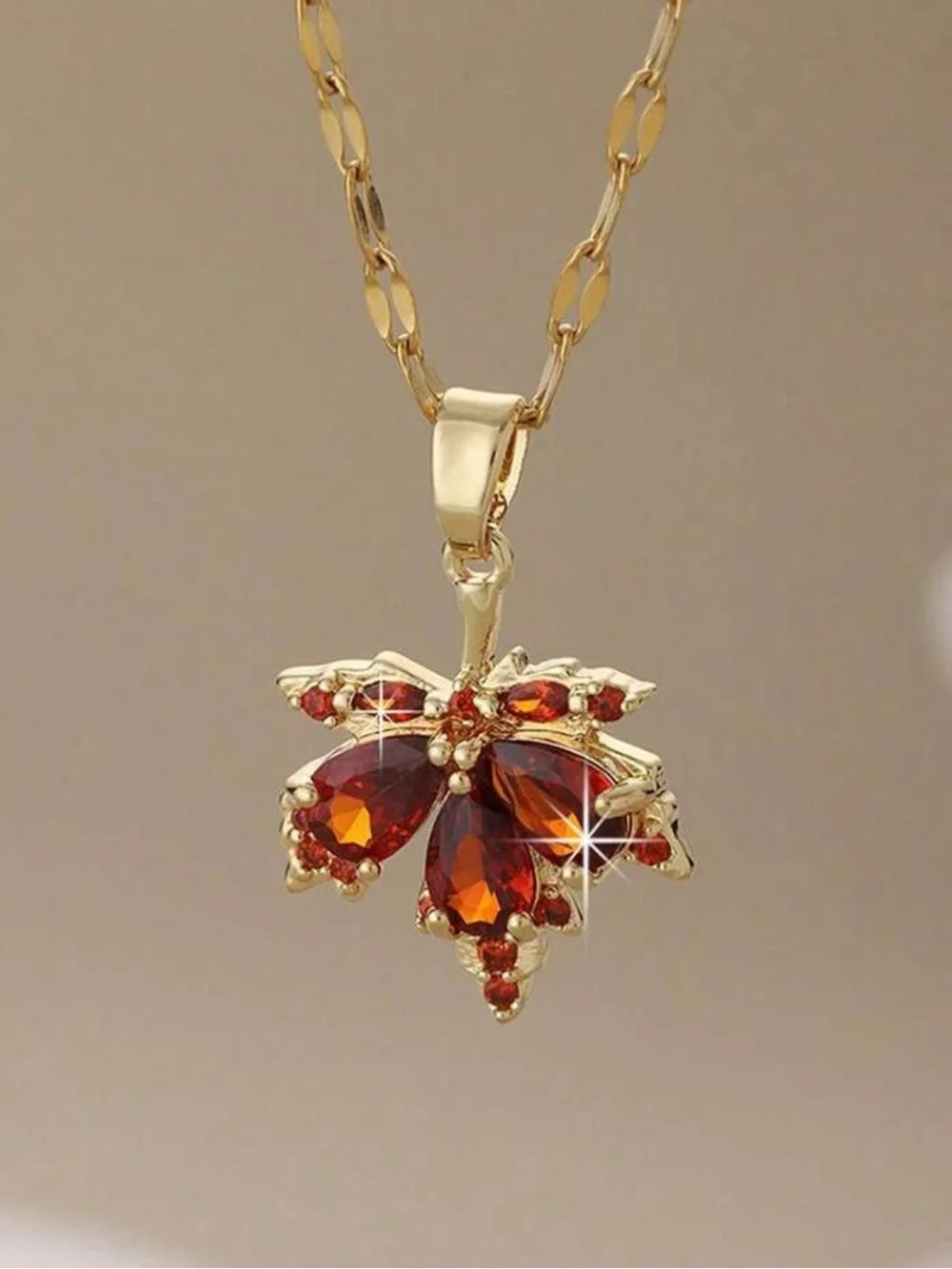 Gold Leaf Necklace with Garnet-Red Crystal Accents